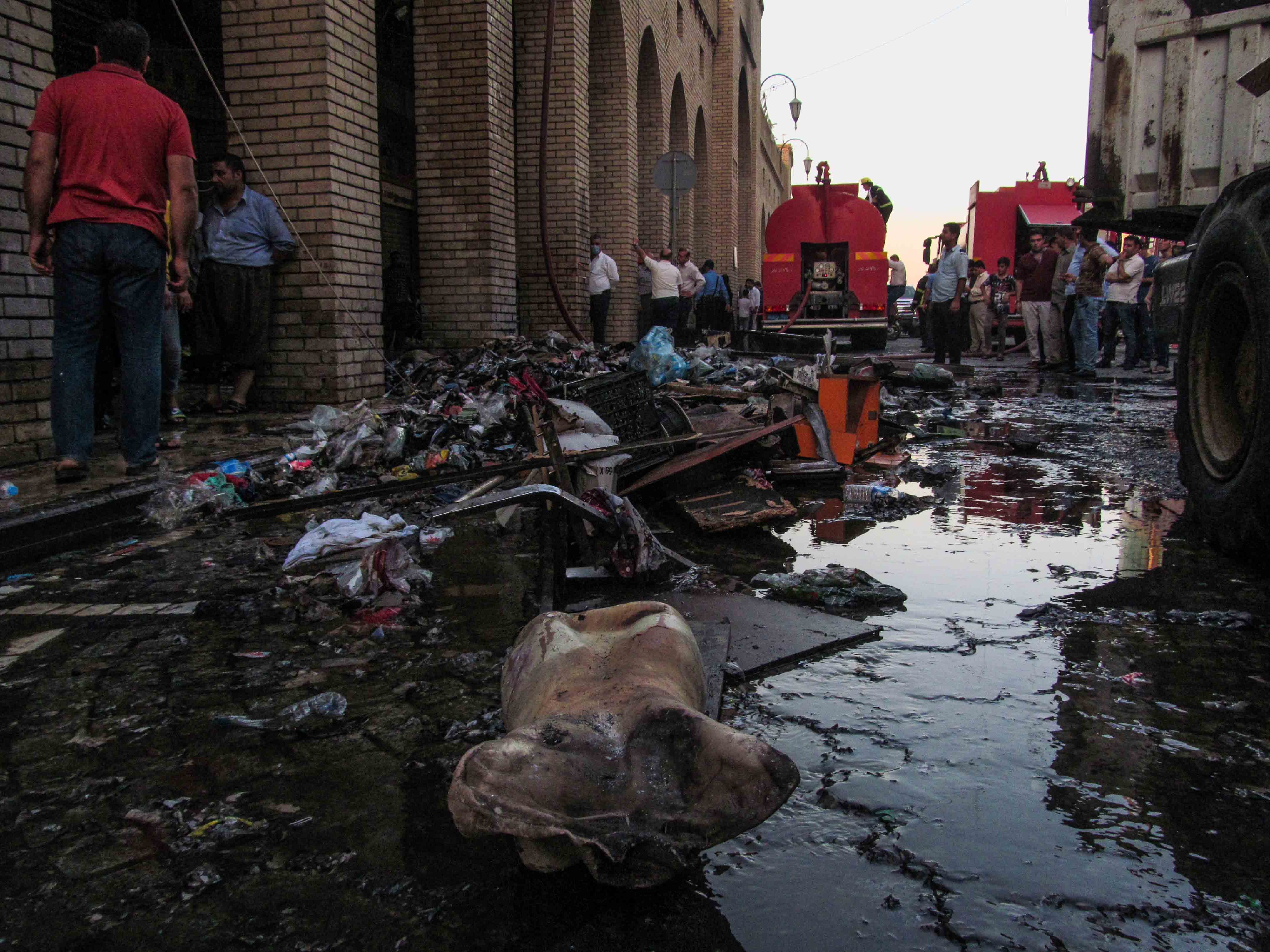 PHOTOS: Firefighters extinguish blaze in Erbil's old market 